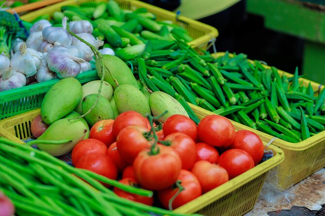 Hands On Thai Cooking Class & Market Tour in Sathon, Bangkok - A market lesson before the cooking begins
