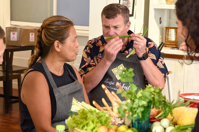 Hands-on Thai Cooking Class & Market Tour in Sukhumvit - Cooking Thai food from the first chop