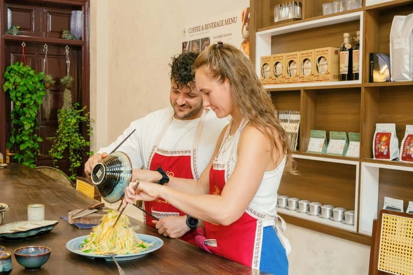 Hanoi Cooking Class: Market Tour, Free Recipe & Beverages - Cooking four Vietnamese dishes by hand