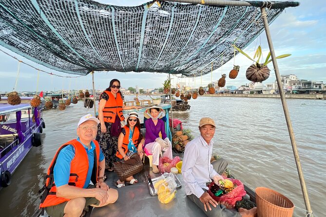 HCM: 2-Day Mekong Delta Floating Market with Cooking & Bike Ride - Lunch, rickshaw, and the road to Can Tho