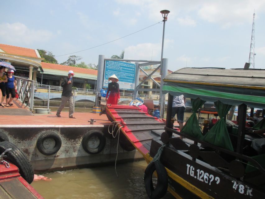 HCMC: Cai Rang Floating Market & Mekong Delta Private Tour - A sampan through coconut-lined canals