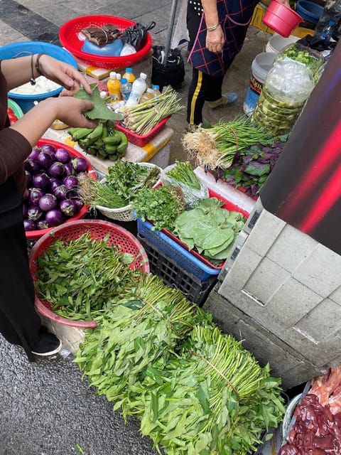 HCMc:Vietnamese Cooking Class with Local market tour & Meal - Preparing ingredients the Vietnamese way