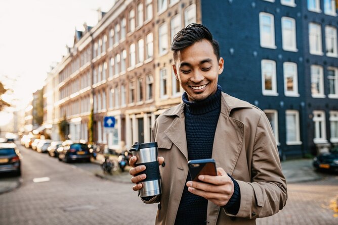 Historic Amsterdam Walking Tour: Royal Palace & Flea Markets - Key points at a glance