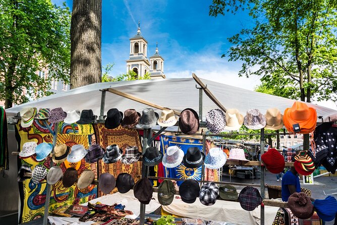 Historic Amsterdam Walking Tour: Royal Palace & Flea Markets - Waterlooplein Market for a change of pace