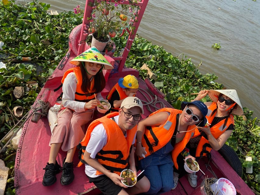 Ho Chi Minh: 1-Day Mekong Delta Tour-Floating Market & Islet - Hu Tieu, pineapple, and the working boat life