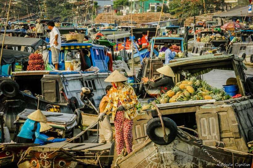 Ho Chi Minh: Group Cai Rang Floating Market 1 Day Tour - Making traditional cakes and pop rice
