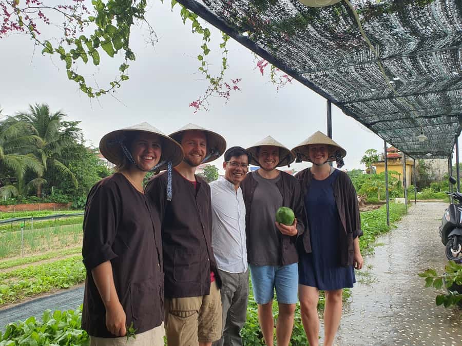 Hoi An Cooking Class With Market and Bamboo Basket Boat Tour - Bay Mau Coconut Village by round boat