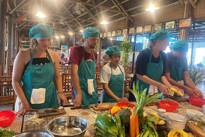 Hoi An Cooking Class With Market Tour and Bamboo Basket Boat Ride - A garden restaurant near Tra Que Village