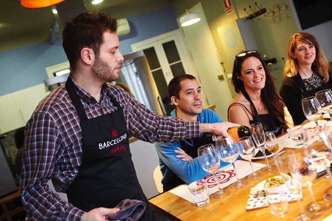 Interactive Paella & Market: Bottomless Wine & Rambla Views - Turning market ingredients into lunch