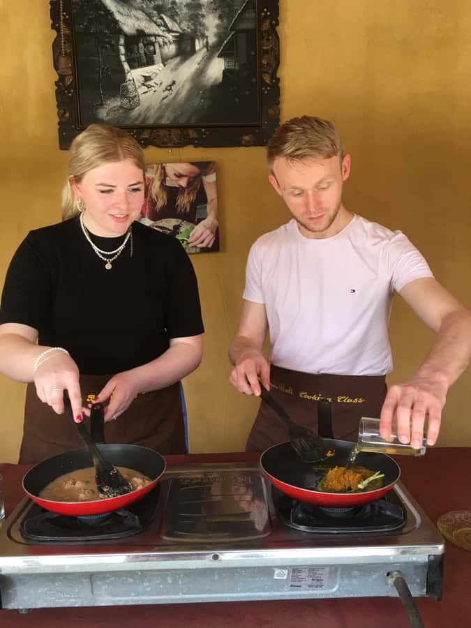 Jambangan bali cooking class with morning market tour - Making offerings and learning coconut oil work