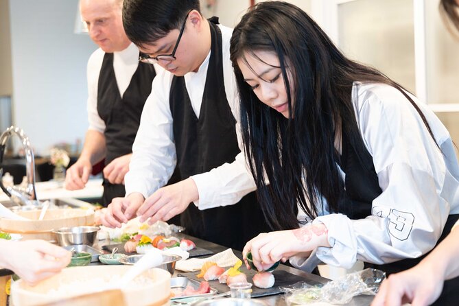 Kyoto: Enjoy Sushi & Market Tour! Best for Family & Couple! - Making nigiri, temari, and temaki