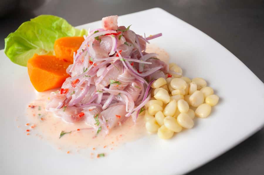 Lima: Market Tour and Cooking Class with Pisco Sour - Four fruits and the food of Surquillo Market