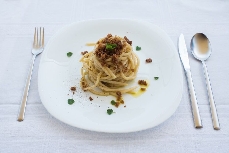 Lucca: Market and Cooking Class at a Local's Home - Sitting down to taste the meal you prepared