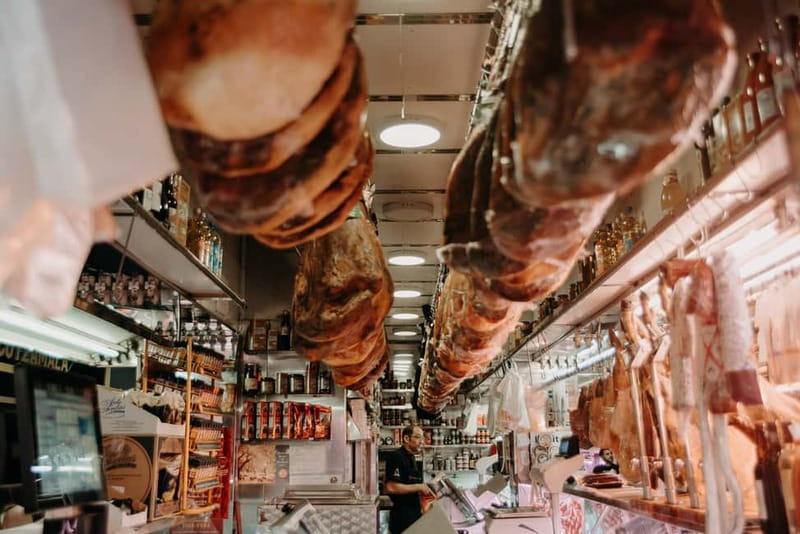 Madrid: Paella & Tapas Cooking Class and Market Visit - Sitting Down to Eat What You Made