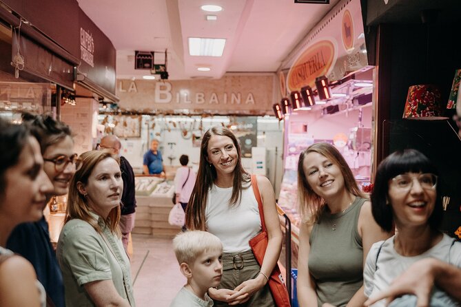 Madrid Tapas & Paella Cooking Experience with Local Market Visit - Lunch, dessert, and the social side