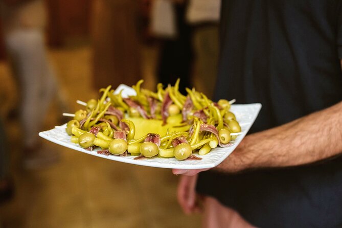 Madrid Tapas & Paella Cooking Experience with Local Market Visit - Who should book this Madrid food experience?