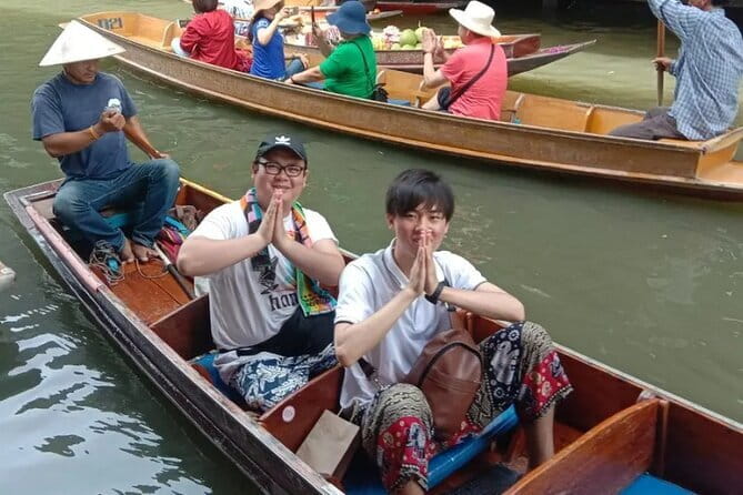 Maeklong Railway and Damnoen Saduak Floating Market Tour - Devaree Boutique and the Amphawa setting