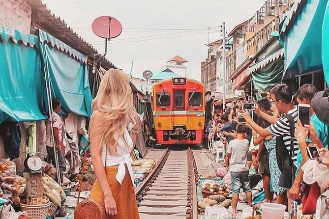 Maeklong Railway & Floating Market Tour (Private & All-Inclusive) - Wat Bang Kung, a temple held by banyan roots