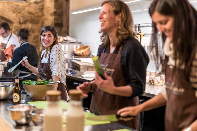Market Gourmet Visit and Spanish Culinary Experience in Barcelona - Four courses, with paella as the main event
