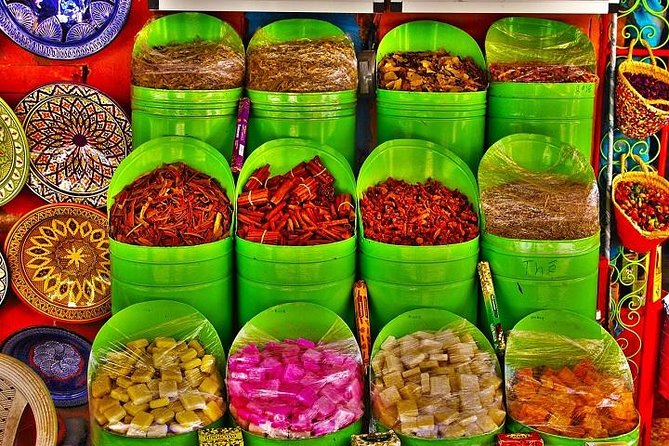 Marrakech: Medina Souks Guided Walking Tour - Medina lanes, fountains, baths, and everyday spaces