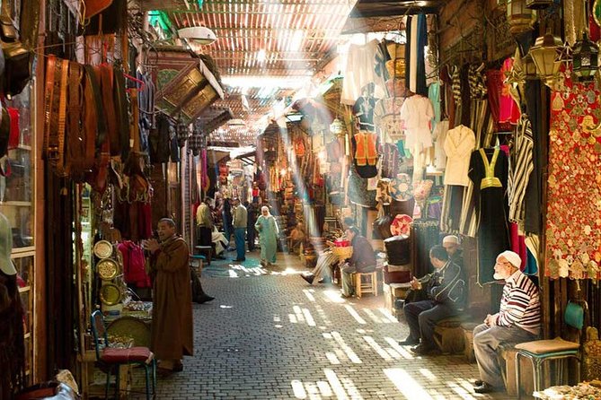 Marrakech Monuments & Souks 3-Hour Tour - Pickup, minibus, and the walking balance