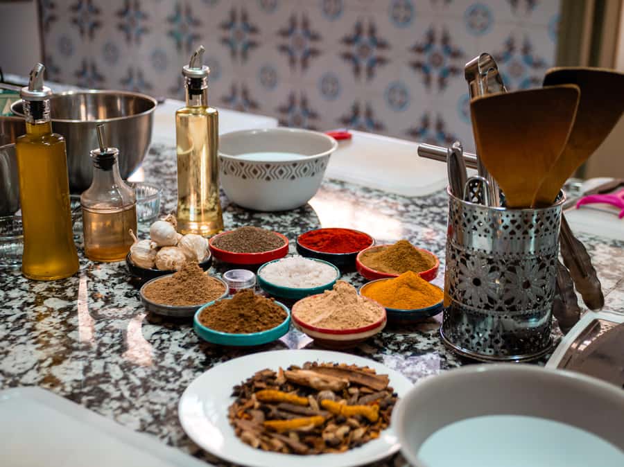 Marrakech: Moroccan Cooking Class with Market Visit and Meal - Sitting down to eat your own work