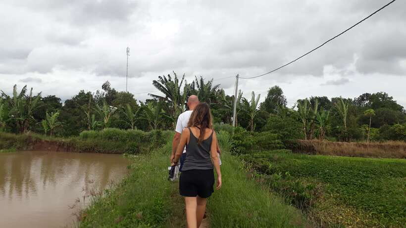 Mekong Day Tour by Car:Cai Be market, Local Island & Cycling - A village walk or cycle after lunch