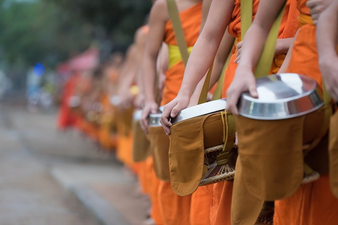 Morning Buddhist Almsgiving, Grand Palace and Flower Market Tour in Bangkok - Who should book this Bangkok morning?