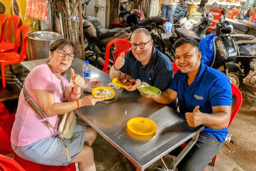 Mumbai Heritage, Street Food & Bazaar Walking Tour - Riding Mumbai’s local train