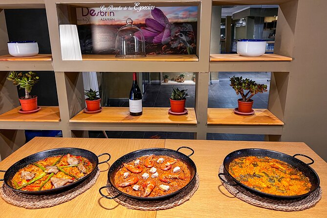 Paella Cooking Class, Wine Tasting & Central Market in Valencia - Tapas, wine, and the finished meal