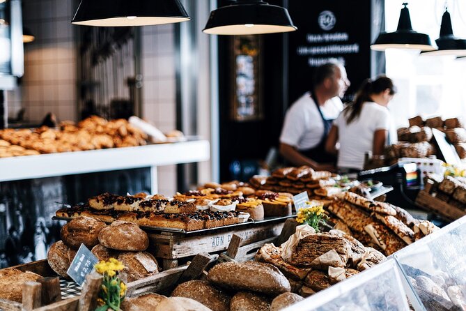 Paris Marché d’Aligre Walking Tour with Chocolate and Cheese Tasting - Cheese, bread, saucisson, and wine