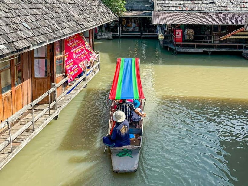 Pattaya: Floating Market Tour with Hotel Transfer & Guide - Taking the paid boat ride