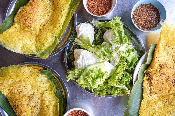 Phnom Penh Morning Market & Food Tour by Tuktuk - Includes All Food & Drinks! - A family shop serving pork and rice