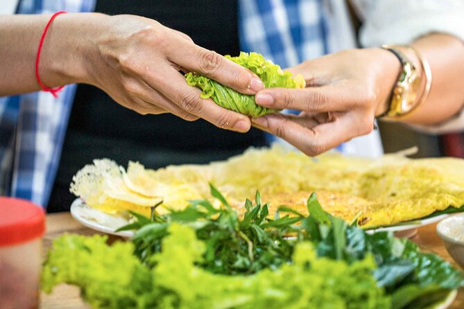 Phnom Penh Morning Market & Food Tour by Tuktuk - Includes All Food & Drinks! - Trying Cambodia’s yellow turmeric crepes