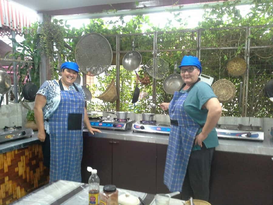 Phuket: Half Day Easy Thai Cooking Class & Local Market Tour - A kitchen garden and a clean cooking setup