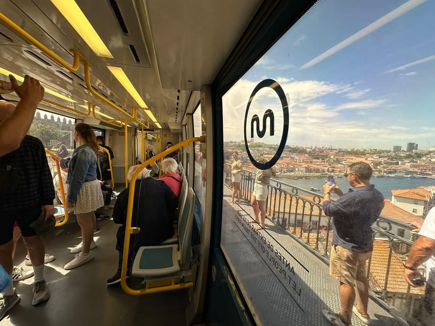 Porto: Local Market Tour & Cooking Class/Showcooking - Cod, local snacks, and pastel de nata