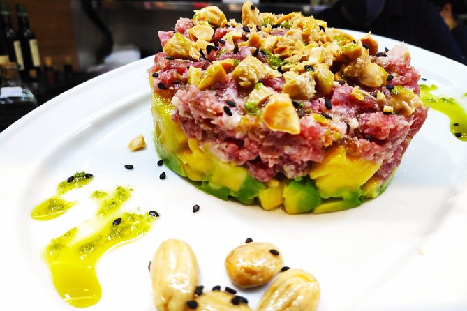 PREMIUM TAPAS TOUR: Paella, Market Tastings, and Winery - Walking past Malaga’s main sights