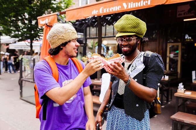 Private Amsterdam Food Tour & Dutch Pancake Class with a Local - Starting with herring and stroopwafels at Albert Cuyp Market
