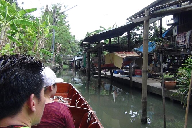 PRIVATE Floating Market + DRAGON Temple + DO like a Local - Mae Klong Railway Market and the 30-minute train-side spectacle