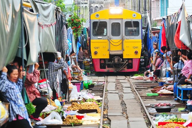 Private Guided Tour to Train Market and Damnoensaduak Floating Market - Mae Klong Railway Market and the passing train