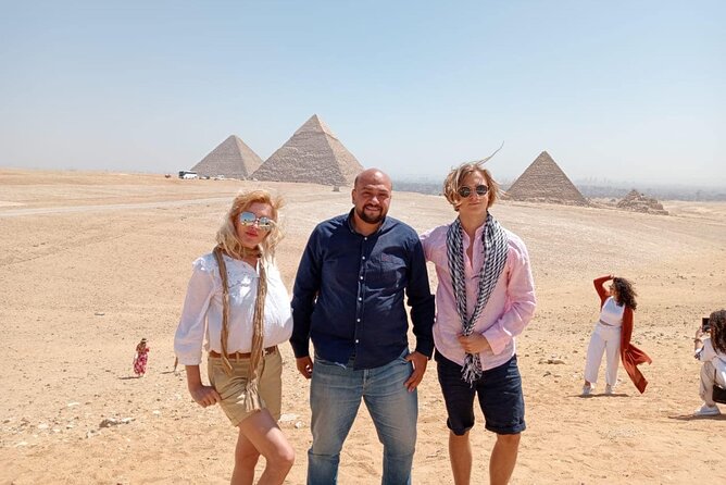 Private Tour Giza Pyramids ,Egyptian Museum and Local Market - Menkaure shows a smaller royal scale