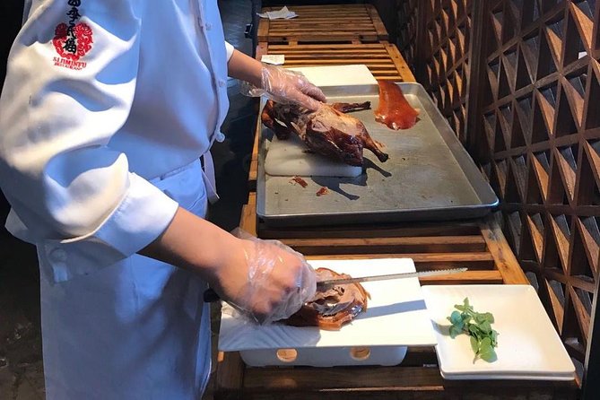 Private Tour to Pearl Market Acrobatic Show & Peking Duck Dinner - Private transport makes the schedule easier