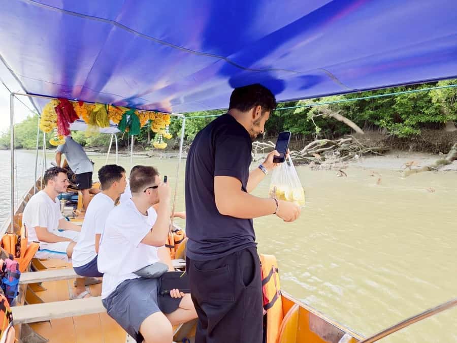 Private Unseen Mangrove Forest and Floating & Railway Market - The train crossing Maeklong Railway Market