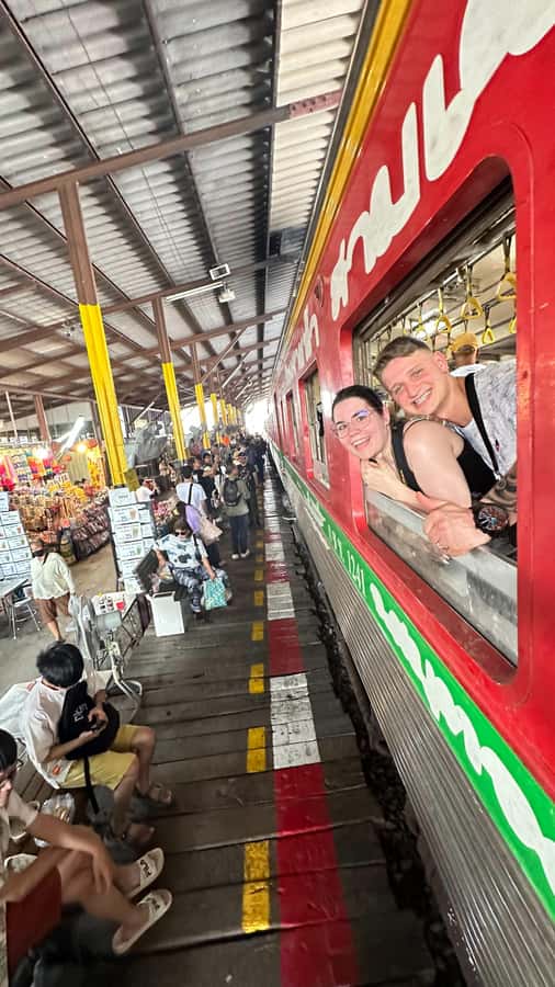 Railway to Waterway: Exploring Railway and Floating Market - Riding the train into Maeklong Railway Market