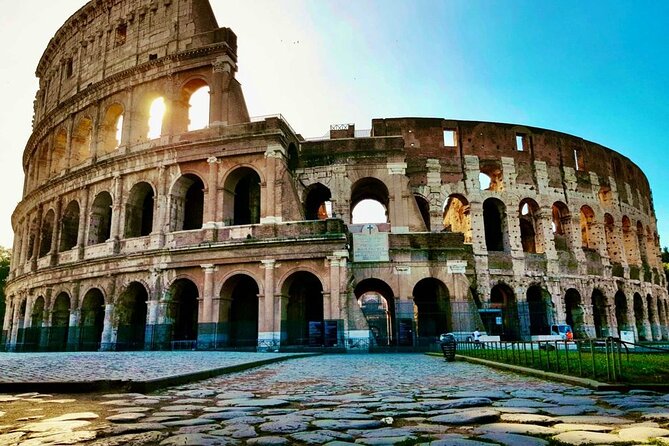 Rome: Colosseum, Roman Forum & Trajan's Market Exterior Tour - Walking along Via dei Fori Imperiali