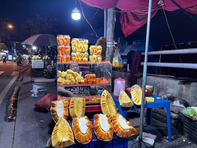 Saigon: Floating Market and Food Tasting Tour by Scooter - District 4 brings bánh mì and the night market