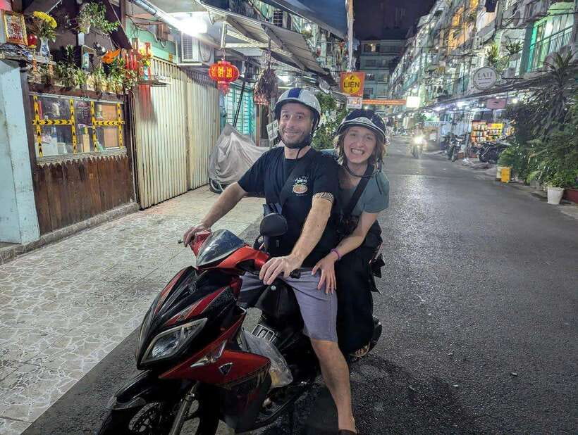 Saigon: Floating Market and Food Tasting Tour by Scooter - District 10 ends with flowers and ice cream