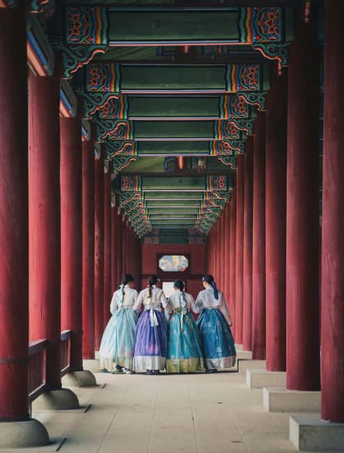 Seoul Day Tour: Gyeongbok Palace, Bukchon, Gwangjang Market - Bukchon’s narrow lanes and hanok roofs