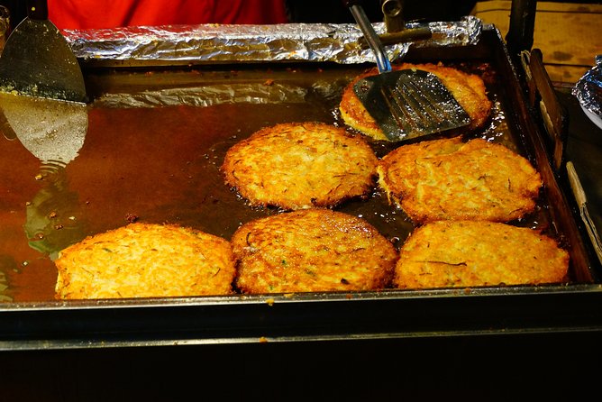 Seoul Night "Private Tour"(Korean BBQ, N-Tower, Seoul Fortress, Local Market) - Cheonggyecheon Stream and the city at street level