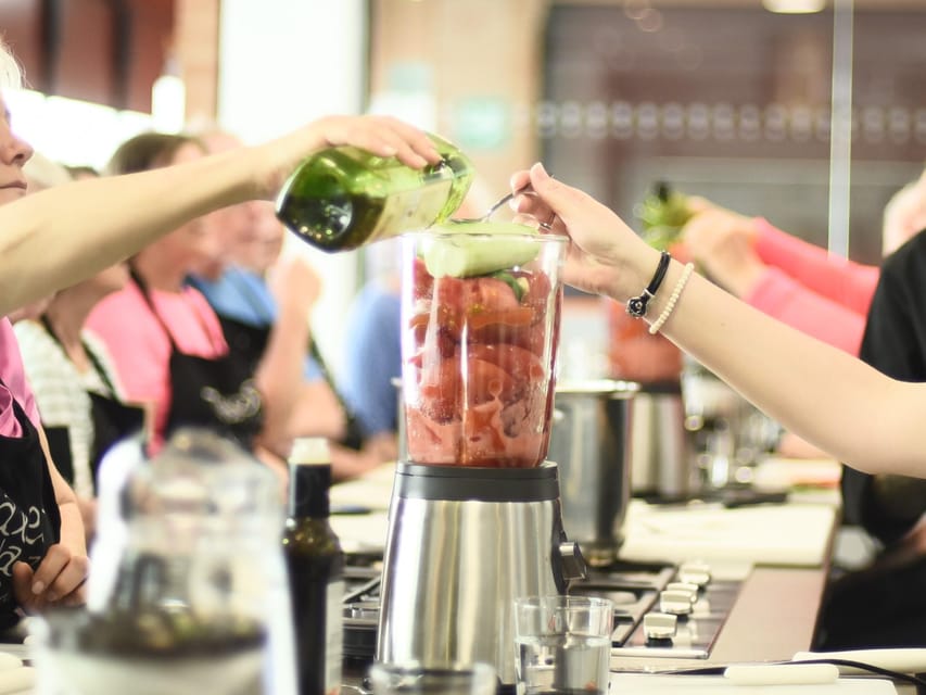 Seville: 3.5-Hour Spanish Cooking Class & Triana Market Tour - From market stalls to the cooking stations